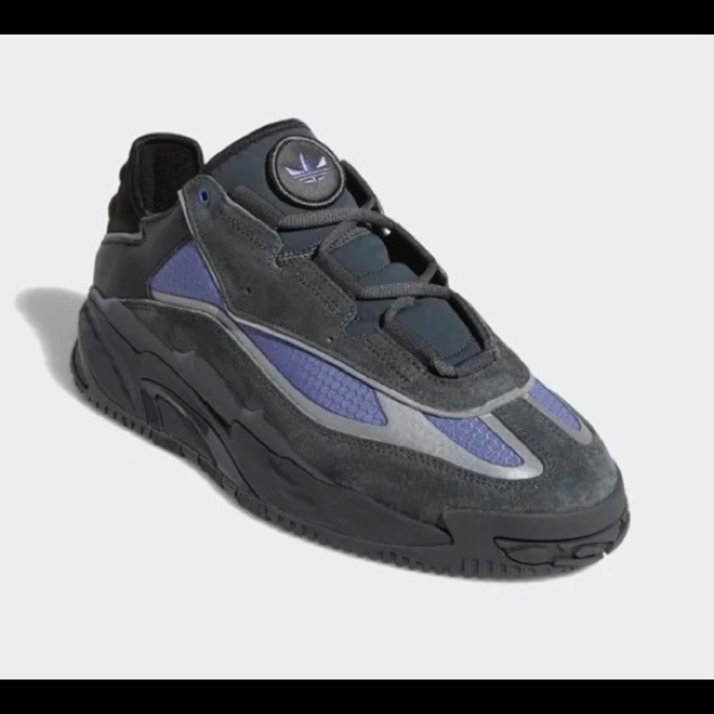 New from Adidas in navy blue and gray, new in box.